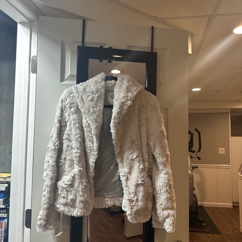 White faux fur coat with a hoodie #winterfashion